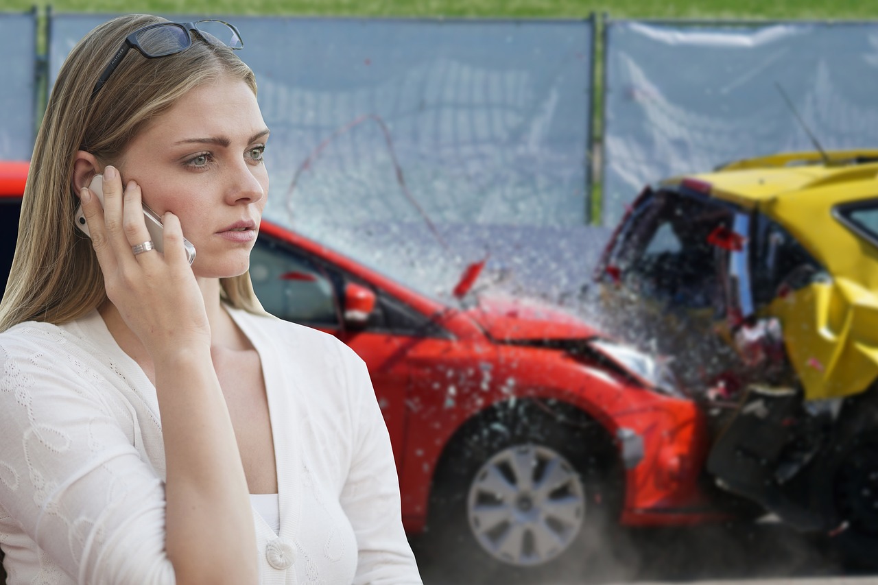 Female on the phone after a Car accident